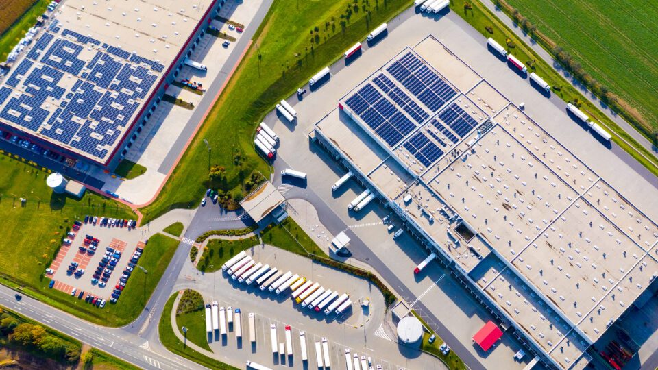 Industrial warehouses with solar panels on the roof